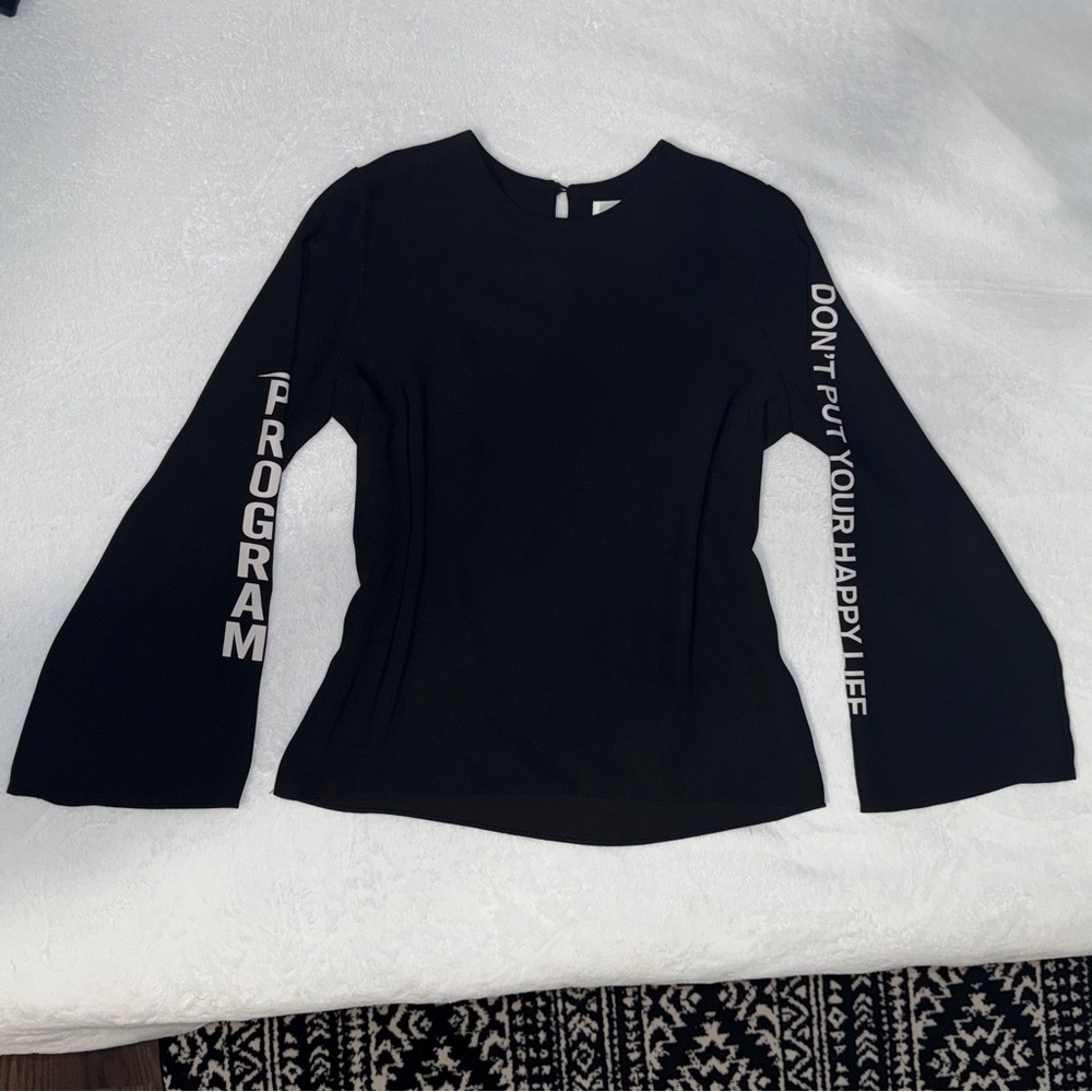 Circle Made in Korea bell sleeve black blouse with white text on sleeves Size S